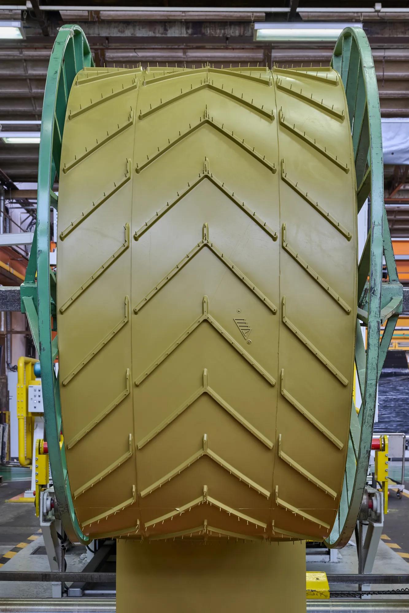 Chevron belts for olives transportation.