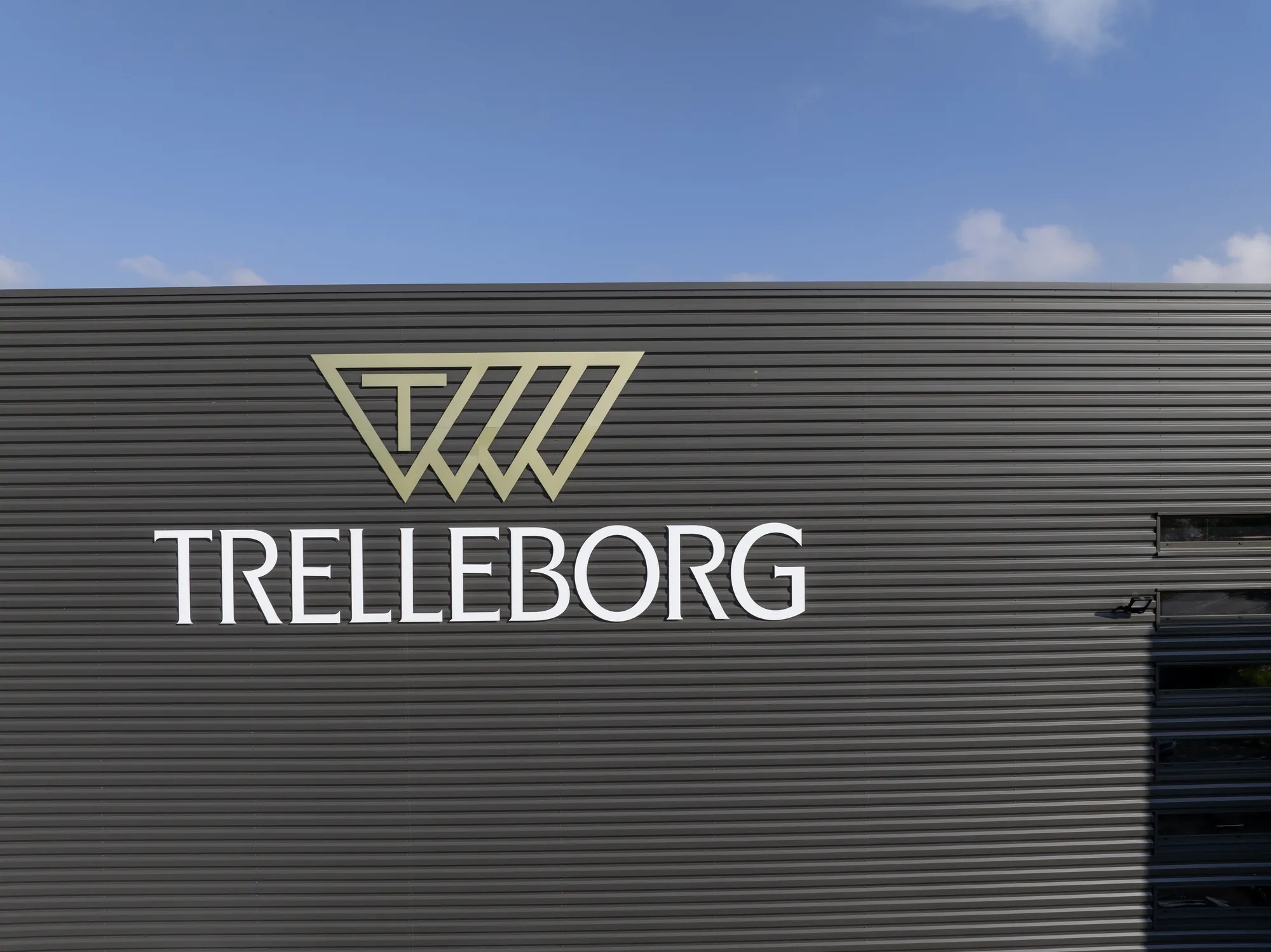 The Trelleborg logo on the front of the factory.