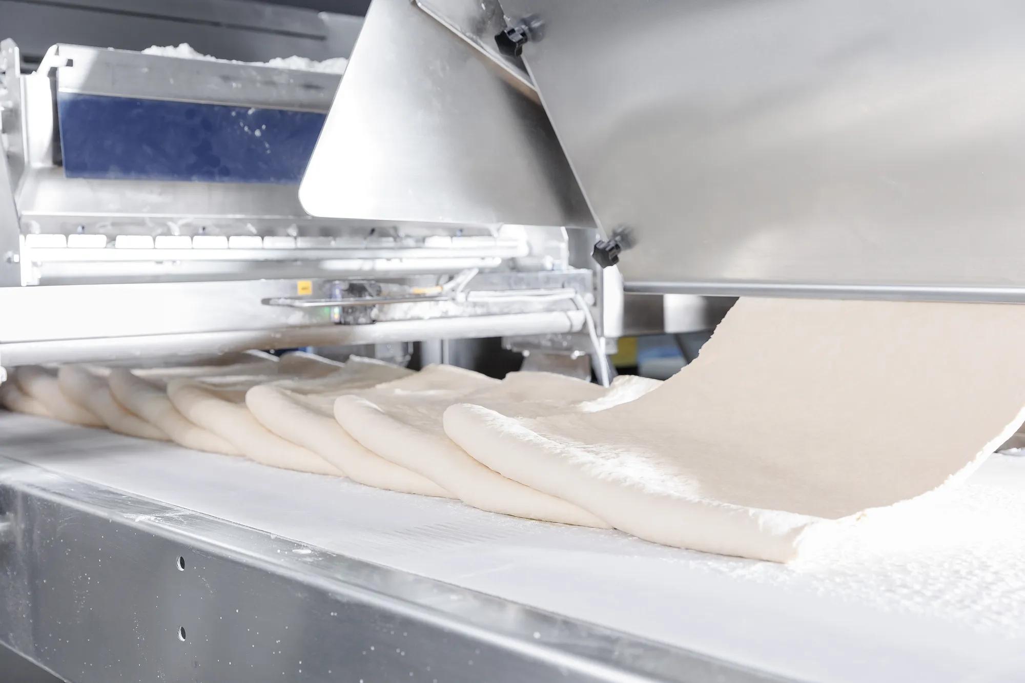 Automated puff pastry dough formation in confectionery production line.