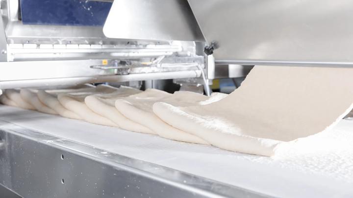Automated puff pastry dough formation in confectionery production line.