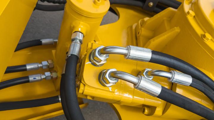 many hydraulics hoses on a machine