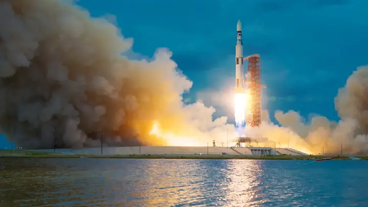 Rocket takes off into the sky. Lots of smoke and gas. The elements of this image furnished by NASA.