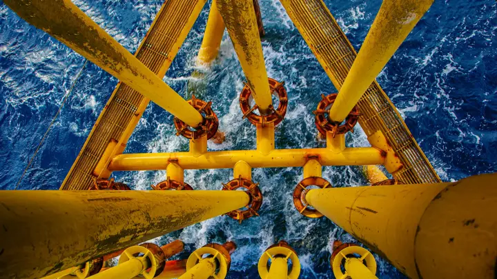 Offshore drill yellow oil and gas wave sea production petroleum pipeline.