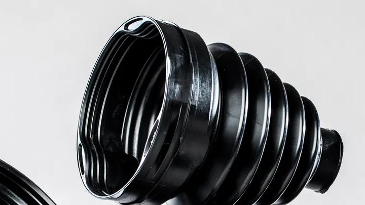 A selection of Trelleborg's Trilobe CVJ Boots is displayed against a white background. Crafted from TPE, these boots offer enhanced reliability, a compact design, and effortless assembly, making them a superior choice for performance and efficiency.
