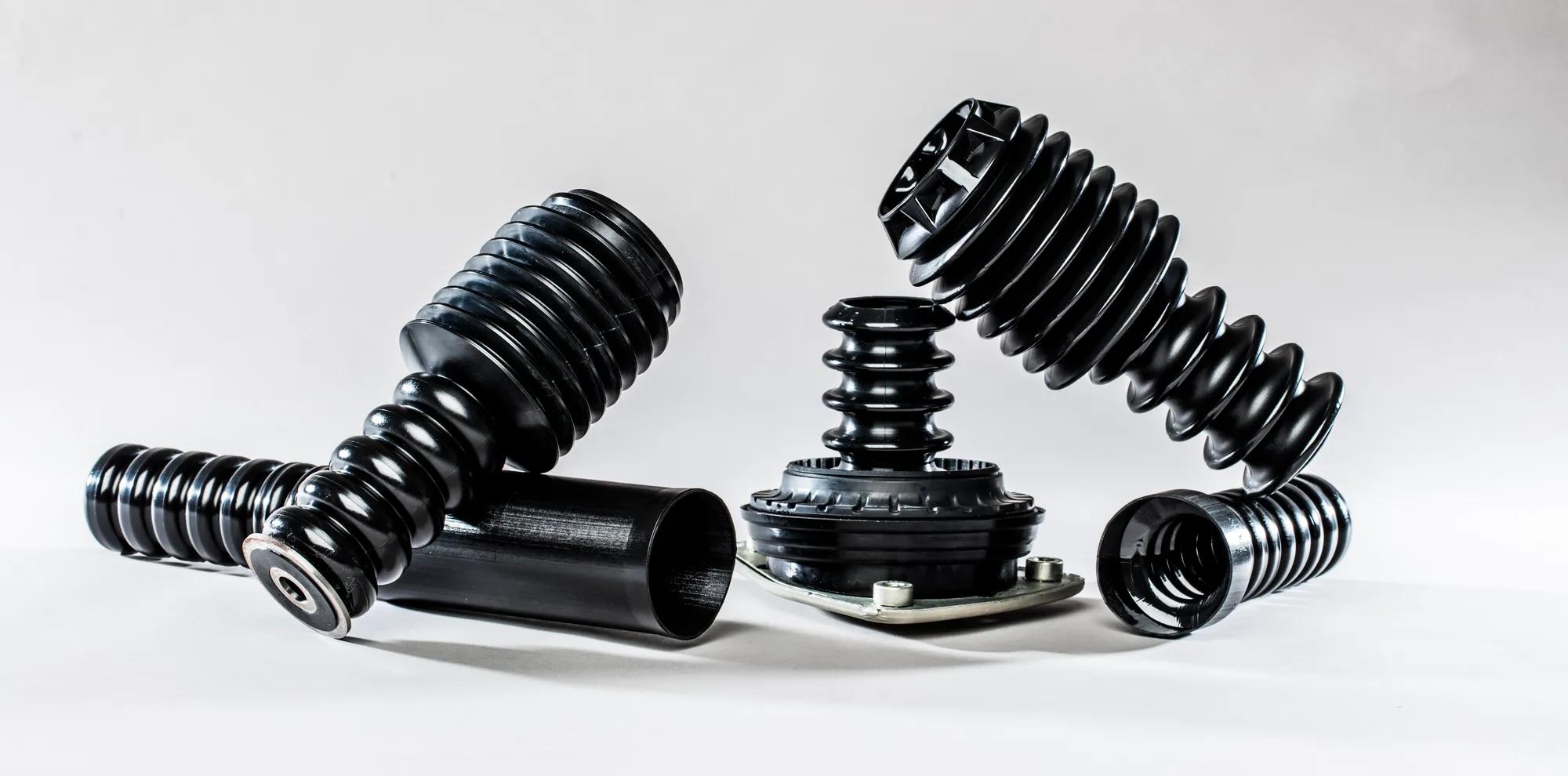 Our Jounce Bumpers: innovative designs made from copolymer copolyester-ether, available as a classic option or a combined bumper and dust cover with an optional clamping ring.