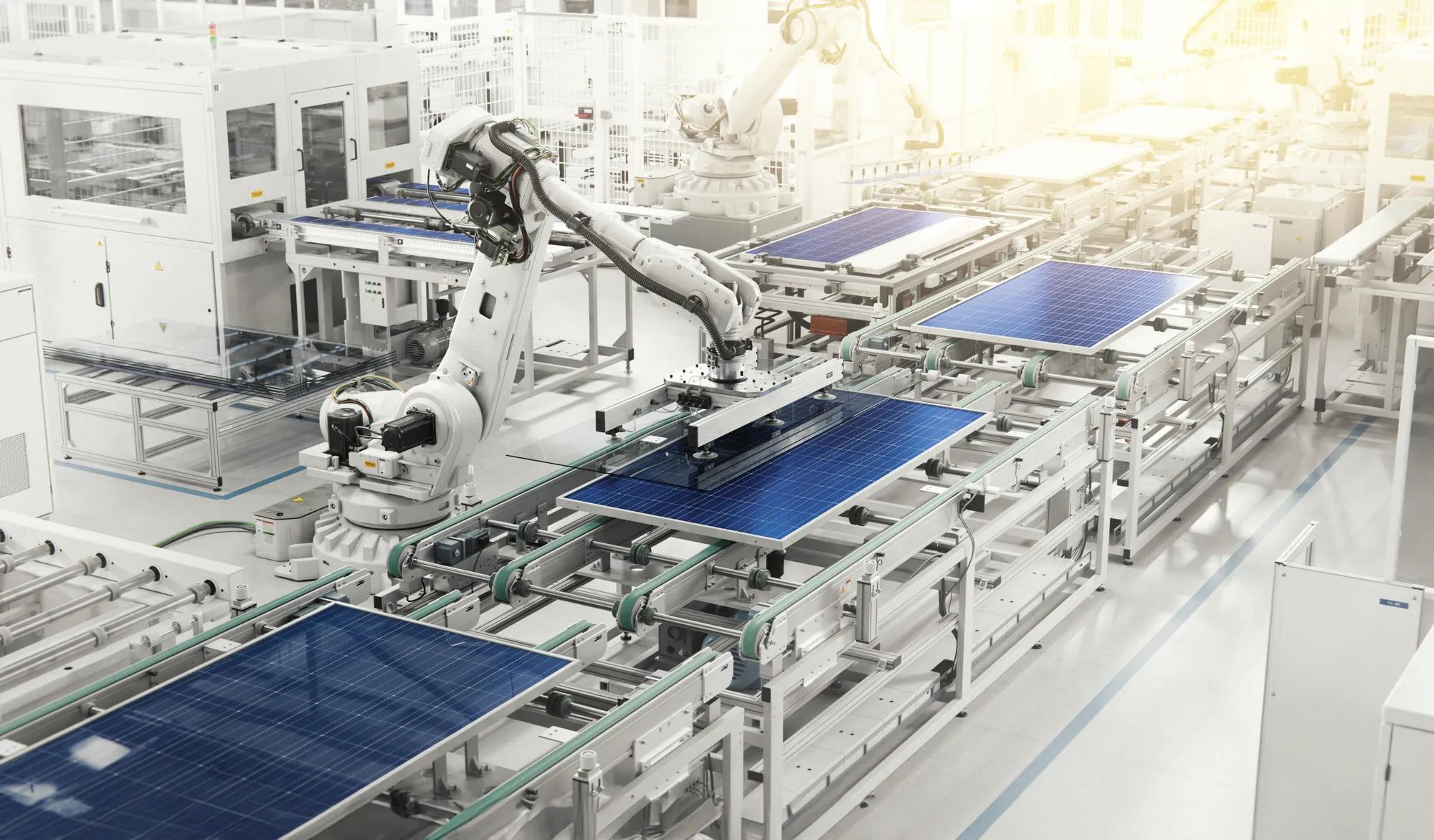 Solar Panel Production Line at Modern Bright Factory. Solar Panels are being Assembled on Conveyor 